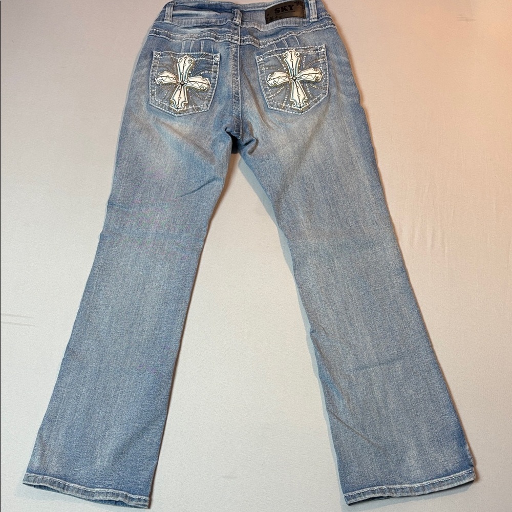 Sky size 9/10 Blue Flare Jeans with Leather Cross and Beaded Blingy Detail